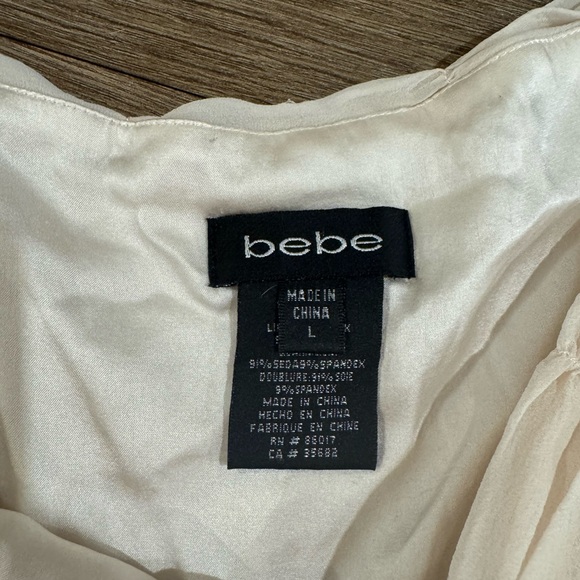 bebe Cream Asymmetrical Layered Skirt - Picture 7 of 9